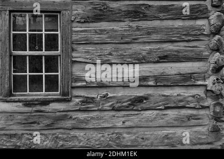 Window and logs of the Maltese Cross Cabin form an American Flag composition; this is where Theodore Roosevelt recovered from tragedies in his life, i Stock Photo