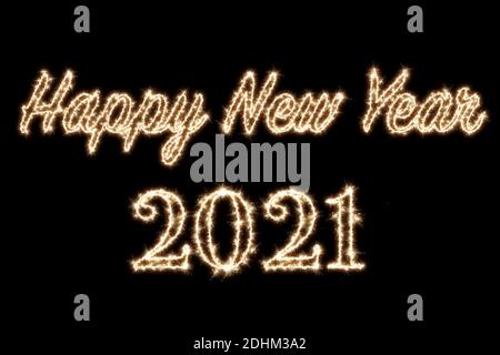 2021 written with Sparkle firework on black background, happy new year Stock Photo