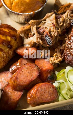 Homemade Barbecue Platter with Ribs Chicken Brisket and Pulled Pork Stock Photo