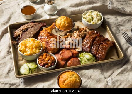 Homemade Barbecue Platter with Ribs Chicken Brisket and Pulled Pork Stock Photo