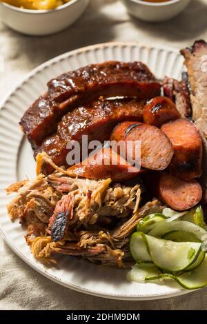 Homemade Barbecue Platter with Ribs Chicken Brisket and Pulled Pork Stock Photo