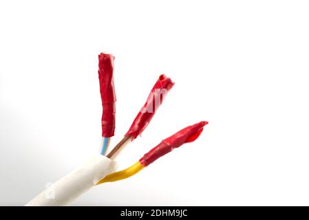 Insulated wire, poor quality insulation, death from electricity, dangerous electricity, wire rewrapped with electrical tape. Stock Photo