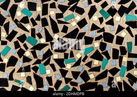 Ceramic tile fragments, Bright abstract mosaic wall Stock Photo