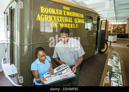 Alabama Tuskegee Institute National Historic Site,George Washington Carver Museum exhibit exhibition collection,Black teen teenage teenager student gi Stock Photo