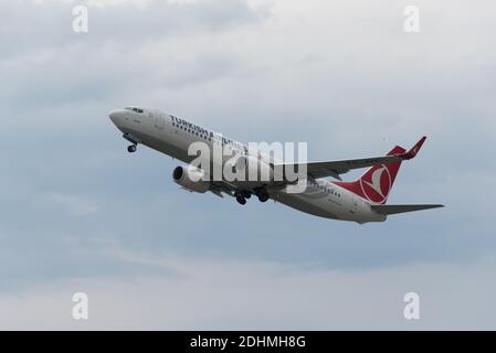 TRABZON, TURKEY - JULY 08, 2016: Turkish Airlines jet taking off from Trabzon airport in windy weather. Stock Photo