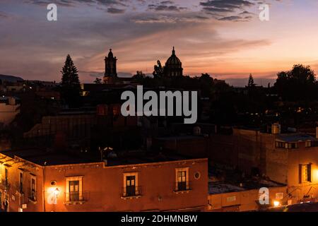 Twilight over the historic Spanish Colonial district of San in Miguel de Allende, Guanajuato, Mexico. Stock Photo