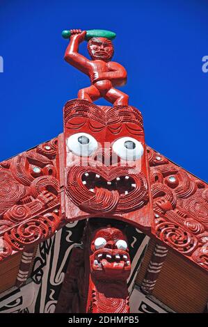 Carvings on The Meeting House (Wharenui), Whakarewarewa Living Thermal Village, Rotorua, Bay of Plenty Region, North Island, New Zealand Stock Photo