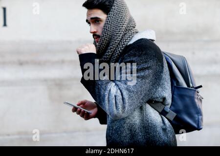 Street style, model after Lemaire Fall-Winter 2016-2017 menswear show held at Rue de l'Ecole de Medecine in Paris, France, on January 20th, 2016. Photo by Marie-Paola Bertrand-Hillion/ABACAPRESS.COM Stock Photo