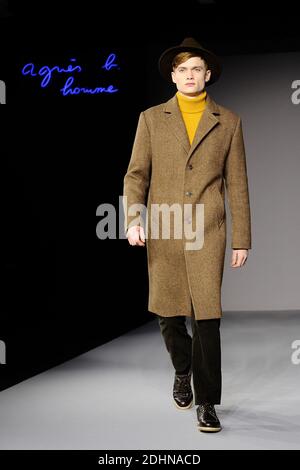 A model walks the runway at the Agnes B. Homme show during Paris Men's ...