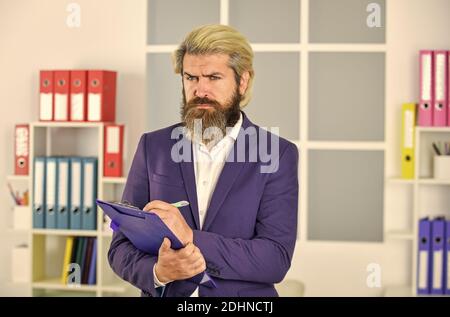 checking the result. businessman hold office folder. business management professional. chief information officer. IT director or CIO. successful crisis manager make notes in documents. Stock Photo