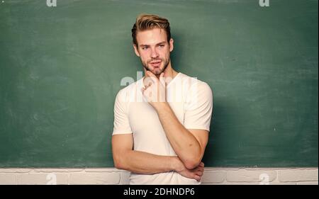 Work hard play harder. student man in classroom. man at blackboard. get knowledge here. online courses. education abroad. college life. young tutor. teachers day. private teaching. back to school. Stock Photo