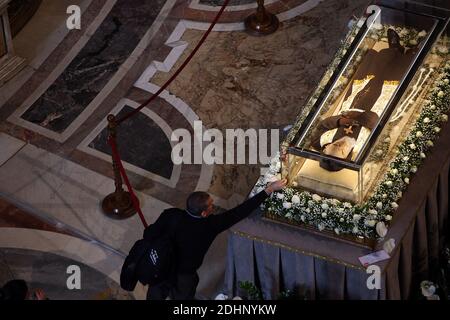 The embalmed corps of Padre Pio is exposed in Saint Peter's Basilica for veneration by the faithful in connection with the ongoing Extraordinary Jubilee Year of Mercy at the Vatican, on Feb. 6, 2016.The embalmed corps of the Catholic saint Italian friar Padre Pio (1887-1968) went on display in St Peter's basilica after being paraded through nearby streets in transparent coffin.Nearly half a century after this death, the body of Padre Pio was moved for the first time from its resting place in a sanctuary at San Giovanni Rotondo in southern Italy.It has been brought to the Vatican at the request Stock Photo