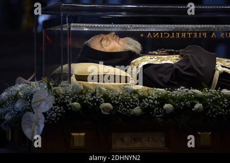 The embalmed corps of Padre Pio is exposed in Saint Peter's Basilica for veneration by the faithful in connection with the ongoing Extraordinary Jubilee Year of Mercy at the Vatican, on Feb. 6, 2016.The embalmed corps of the Catholic saint Italian friar Padre Pio (1887-1968) went on display in St Peter's basilica after being paraded through nearby streets in transparent coffin.Nearly half a century after this death, the body of Padre Pio was moved for the first time from its resting place in a sanctuary at San Giovanni Rotondo in southern Italy.It has been brought to the Vatican at the request Stock Photo