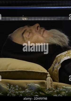 The embalmed corps of Padre Pio is exposed in Saint Peter's Basilica for veneration by the faithful in connection with the ongoing Extraordinary Jubilee Year of Mercy at the Vatican, on Feb. 6, 2016.The embalmed corps of the Catholic saint Italian friar Padre Pio (1887-1968) went on display in St Peter's basilica after being paraded through nearby streets in transparent coffin.Nearly half a century after this death, the body of Padre Pio was moved for the first time from its resting place in a sanctuary at San Giovanni Rotondo in southern Italy.It has been brought to the Vatican at the request Stock Photo