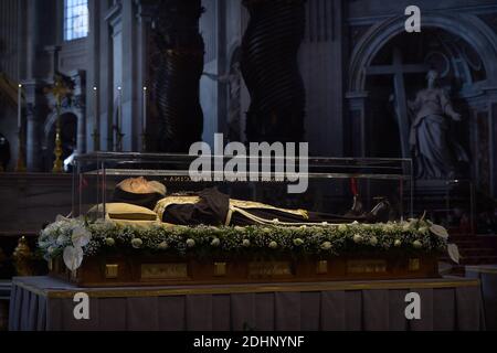 The embalmed corps of Padre Pio is exposed in Saint Peter's Basilica for veneration by the faithful in connection with the ongoing Extraordinary Jubilee Year of Mercy at the Vatican, on Feb. 6, 2016.The embalmed corps of the Catholic saint Italian friar Padre Pio (1887-1968) went on display in St Peter's basilica after being paraded through nearby streets in transparent coffin.Nearly half a century after this death, the body of Padre Pio was moved for the first time from its resting place in a sanctuary at San Giovanni Rotondo in southern Italy.It has been brought to the Vatican at the request Stock Photo