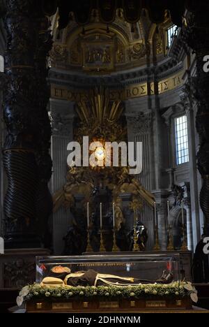 The embalmed corps of Padre Pio is exposed in Saint Peter's Basilica for veneration by the faithful in connection with the ongoing Extraordinary Jubilee Year of Mercy at the Vatican, on Feb. 6, 2016.The embalmed corps of the Catholic saint Italian friar Padre Pio (1887-1968) went on display in St Peter's basilica after being paraded through nearby streets in transparent coffin.Nearly half a century after this death, the body of Padre Pio was moved for the first time from its resting place in a sanctuary at San Giovanni Rotondo in southern Italy.It has been brought to the Vatican at the request Stock Photo