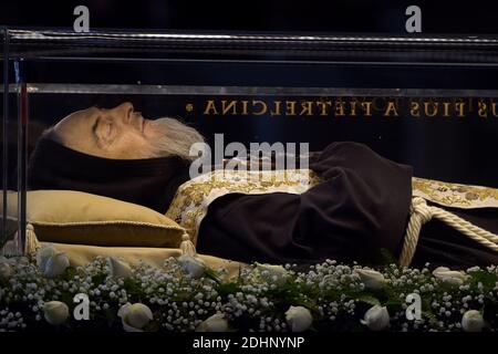 The embalmed corps of Padre Pio is exposed in Saint Peter's Basilica for veneration by the faithful in connection with the ongoing Extraordinary Jubilee Year of Mercy at the Vatican, on Feb. 6, 2016.The embalmed corps of the Catholic saint Italian friar Padre Pio (1887-1968) went on display in St Peter's basilica after being paraded through nearby streets in transparent coffin.Nearly half a century after this death, the body of Padre Pio was moved for the first time from its resting place in a sanctuary at San Giovanni Rotondo in southern Italy.It has been brought to the Vatican at the request Stock Photo