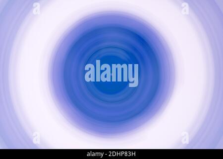 Blue or purple concentric colorful circles, abstract blurred vortex, swirl. Stock Photo