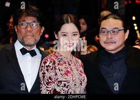Mark Lee Ping-Bing (L-cameraman of 'Chang Jiang Tu' awarded Silver Bear for Outstanding Artistic Contribution), Xin Zhi Lei and Director Yang Chao attending the Red Carpet before the Closing Ceremony during the 66th Berlinale, Berlin International Film Festival in Berlin, Germany on February 20, 2016. Photo by Aurore Marechal/ABACAPRESS.COM