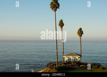 Palms and gazebo at Shore Cliff Hotel in Pismo Beach in San Luis Obispo County, California, famous for its Pismo Clams, beaches, and sand dunes. Stock Photo