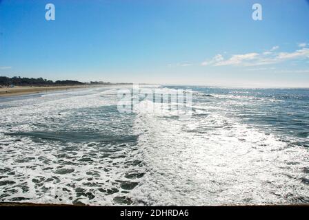 Rolling breakers at Pismo Beach in San Luis Obispo County, California, famous for its Pismo Clams, beaches, and sand dunes. Stock Photo