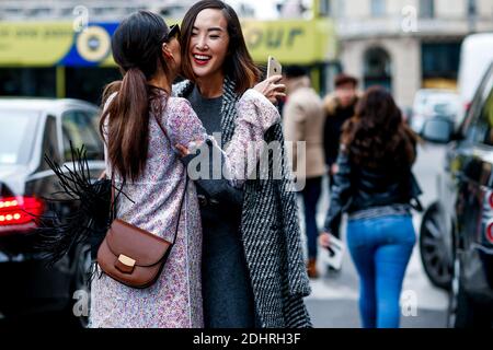 Street style, Evangelie Smyrniotaki and Chriselle Lim arriving at