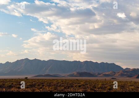 The rugged desert landscape near the famous red sand dunes at Sossusvlei, Namibia. Stock Photo