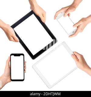 Hands with tablet computers and mobile phones with blank screens on white background Stock Photo