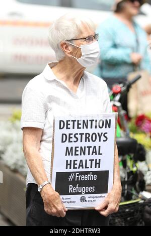 Sydney, Australia. 12th December 2020. Protesters rallied outside Sydney Town Hall to call for freedom for those in detention in Australia, Nauru and PNG and permanent protection for people on Temporary Protection visas. Credit: Richard Milnes/Alamy Live News Stock Photo