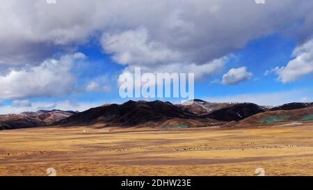 (201212) -- QILIAN, Dec. 12, 2020 (Xinhua) -- Aerial photo taken on Dec. 10, 2020 shows winter scenery of Qilian County, northwest China's Qinghai Province. (Xinhua/Zhang Hongxiang) Stock Photo