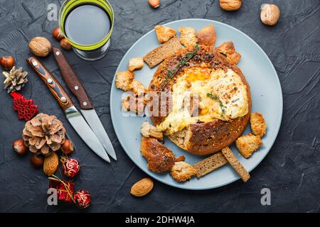 Baked camembert cheese and homemade bread.French cheese. Stock Photo