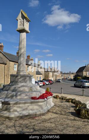 War Memorial in Bampton, Oxfordshire, UK, a pretty village in the Cotswolds. Stock Photo