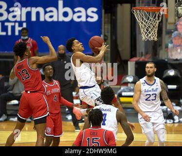 Newark, New Jersey, USA. 12th Dec, 2020. Seton Hall Pirates guard Jared Rhoden (14) drives to the basket in the first half at the Prudential Center in Newark, New Jersey. Seton Hall defeated St Johns 77-68. Duncan Williams/CSM/Alamy Live News Stock Photo