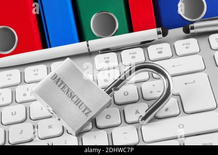 Lock with file folders, keyboard and German Data protection Stock Photo