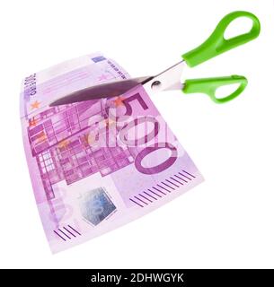 Von einem Euro Geldschein wird mit einer Schere ein Stück abgeschnitten. Symbol Steuern und Abgaben Stock Photo
