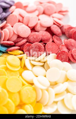 Rainbow colors of round chocolate chips for melting chocolate