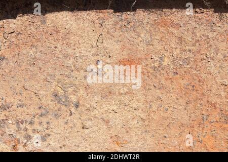 Weathered and rusty sheet metal with a shadow and spider webs on top and space to input text.  Abstract background texture. Stock Photo