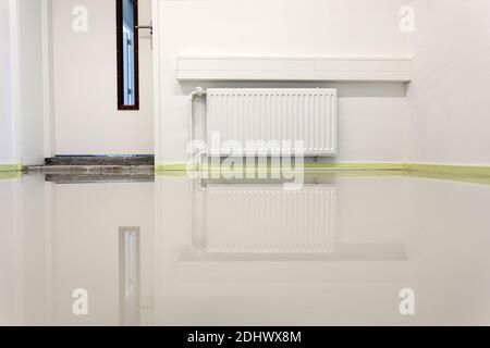 LAREN, THE NETHERLANDS - MAY 16, 2012: Yellow Masking Tape to protect while installing a synthetic cast floor. Stock Photo