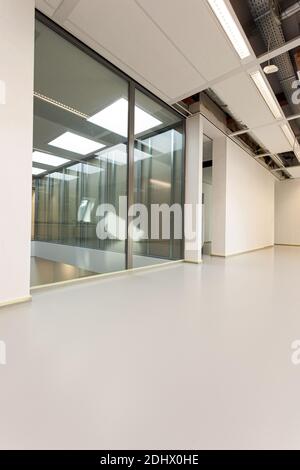 LAREN, THE NETHERLANDS - MAY 16, 2012: Empty interior of a modern renovated office building Stock Photo