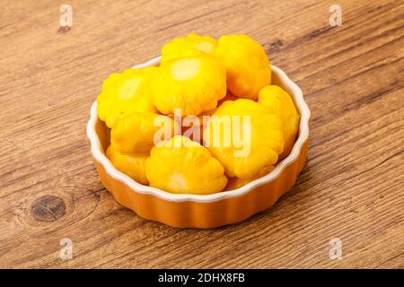 Marinated baby patissons in the bowl Stock Photo