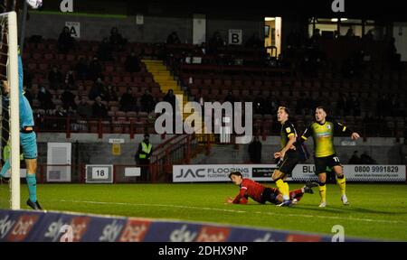 Crawley UK 12th December 2020 -  Tom Nichols of Crawley heads against the bar which led to their second goal scored by Max Watters during the Sky Bet EFL League Two match between Crawley Town and Barrow AFC  at the People's Pension Stadium - Editorial use only. No merchandising.  - for details contact Football Dataco  : Credit Simon Dack TPI / Alamy Live News Stock Photo