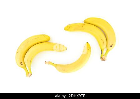 Banana fruits on white background. Flat lay. Top view. Yellow concept with bananas Stock Photo