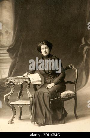 Portrait of an unknown emigrant talian woman in Buenos Aires (photo taken in the Estudio Fotografico Rivadavia 1921, Buenos Aires. 1910 circa) Stock Photo