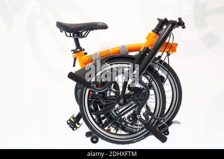 brompton folding bicycle isolated on white Stock Photo