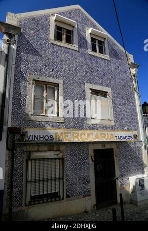 Blue tiled walls on Portuguese shop. Stock Photo
