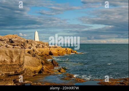 The Trinity House Obelisk at Portland Bill, on the Isle of Portland, Dorset, UK. Built in 1844 as a day-mark to warn ships off the coastal cliffs. Stock Photo