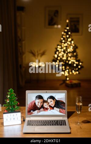 Videocall on the laptop in Christmas day Stock Photo
