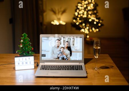 Videocall on the laptop in Christmas day Stock Photo