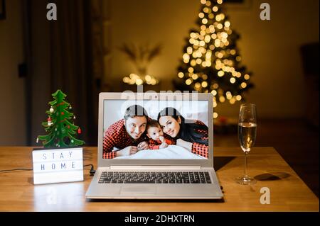 Videocall on the laptop in Christmas day Stock Photo