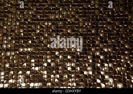 Black squares texture. Snake skin texture. Small shiny black squares. Stock Photo